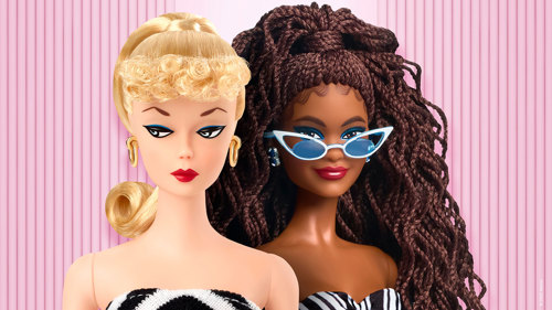 Two Barbie dolls side by side. One has blonde hair in curls and a ponytail, gold hoop earrings, and a black-and-white striped strapless dress. The other has long brown braided hair, blue earrings, white cat-eye sunglasses, and a black-and-white patterned strapless dress.